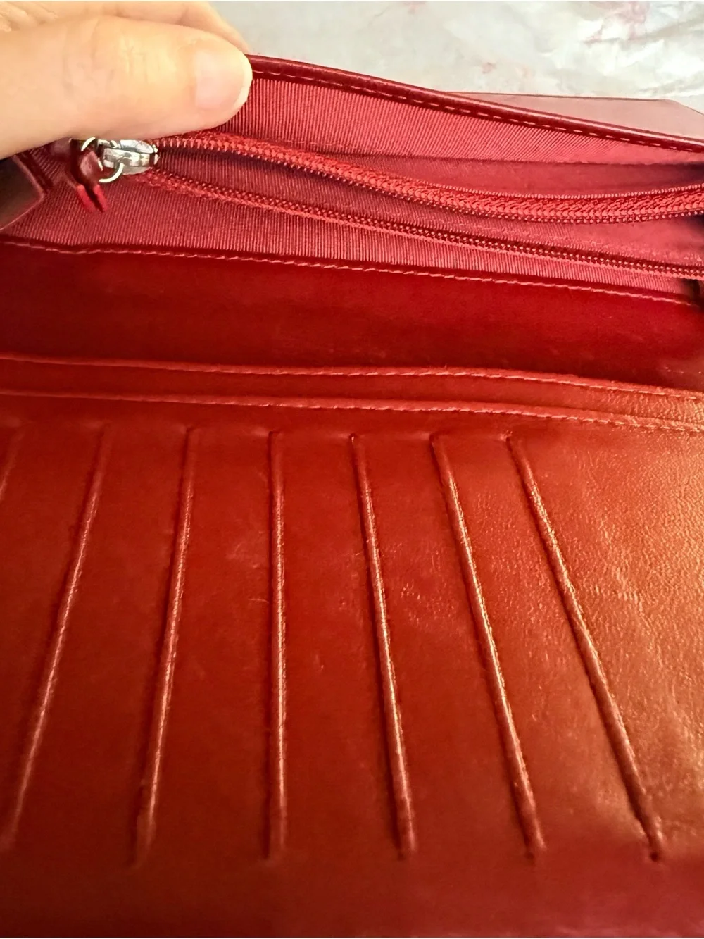 Authentic CHANEL Quilted Red Lambskin Leather Long Wallet with Silver CC Emblem.